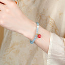 Serene Persimmon – 6mm Aquamarine Bracelet