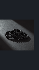 Men's black stone bracelets — mobile hero background