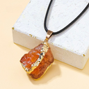 Golden Aura Raw Crystal Pendant Collection