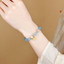 Lotus Bloom – 8mm Aquamarine Bracelet with Rose Quartz